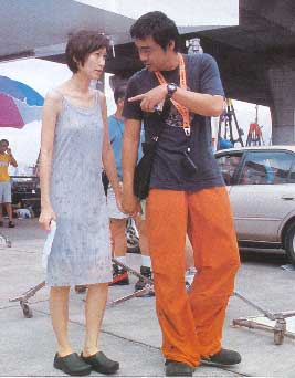 Amy Kwok and Lau Ching-wan on the film set